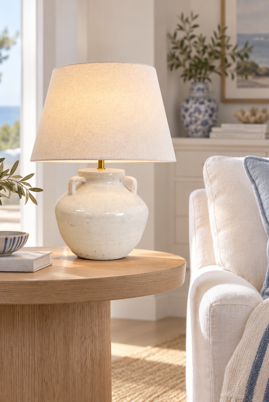 Gianee lamp styled in a refined blue and white coastal living room