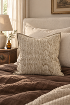 EADIE Lowan Cushion - Natural/Chocolate - 50 cm styled in bedroom
