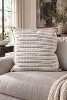 Large Hagen Cushion - Off White/Slate - 60cm styled in deep sofa