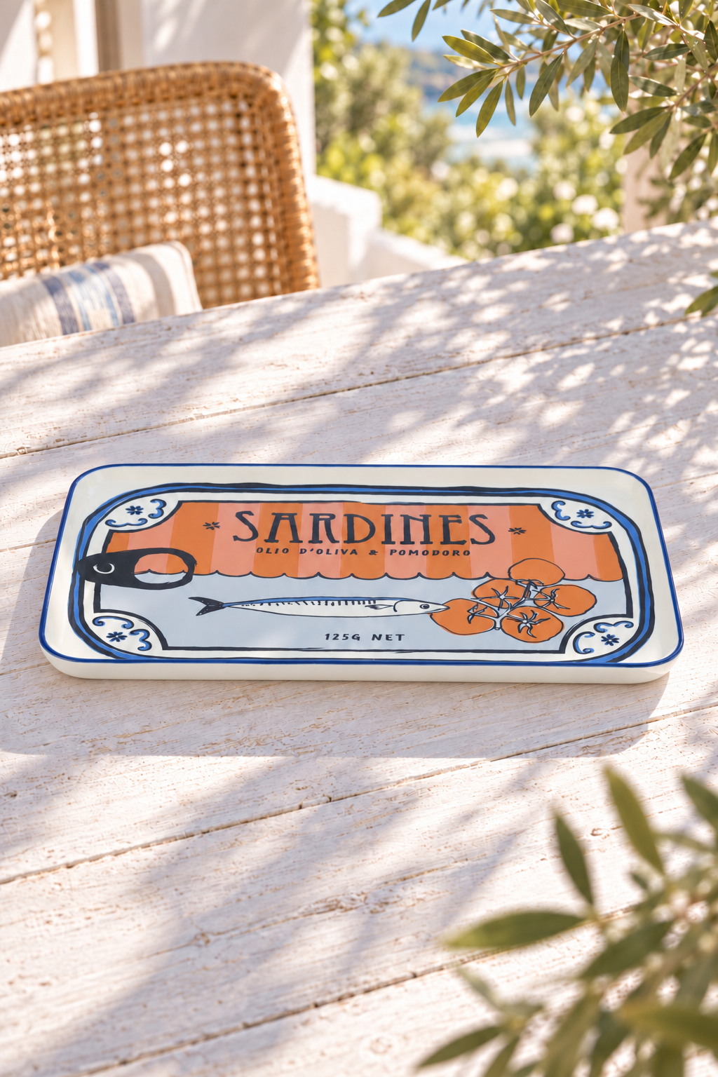 Sardines rectangular serving plate 38.5 by 25 centimetres on a sunlit coastal table