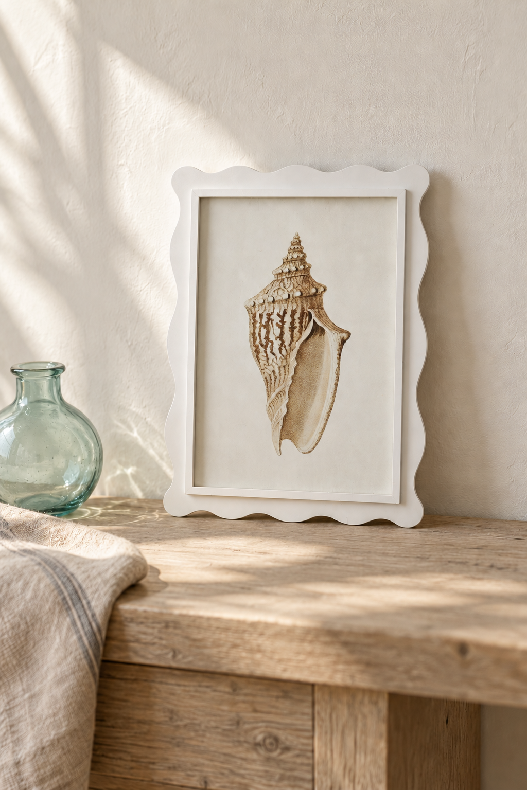 Scalloped Shell Study B leaning on a coastal console