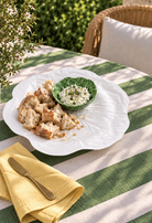 White Deep Platter – Cabbage Melamine styled with bread and dip on a green and white striped tablecloth
